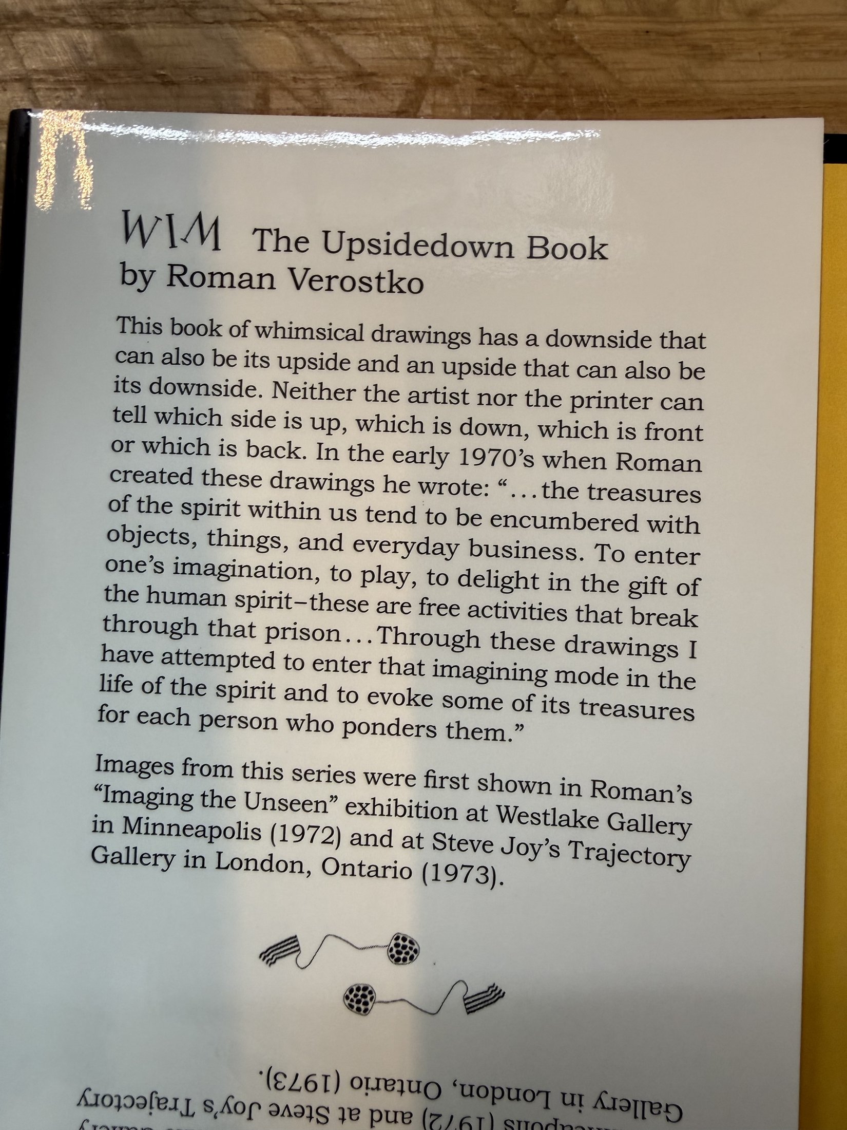 jacket blurb: 'WIM — The Upsidedown Book by Roman Verostko' (rotated upright)