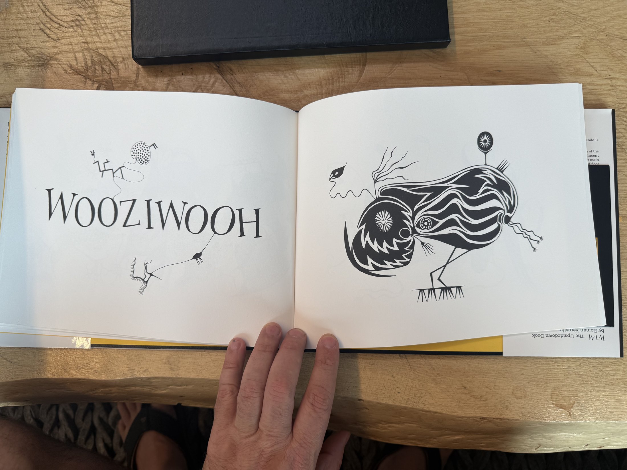 interior spread: 'WOOZIWOOH' + bird creature drawing